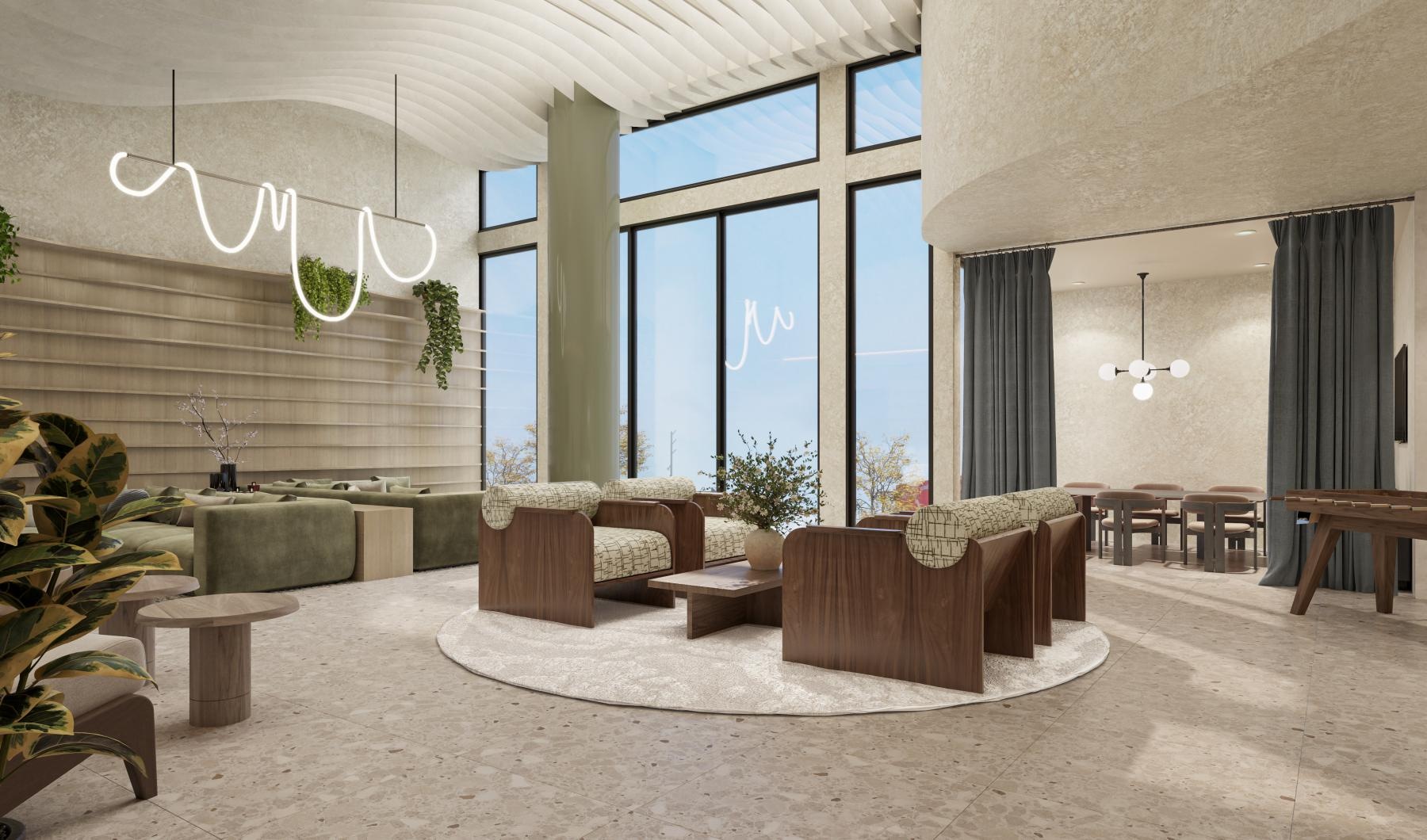 a clubroom with couches, tables and chairs