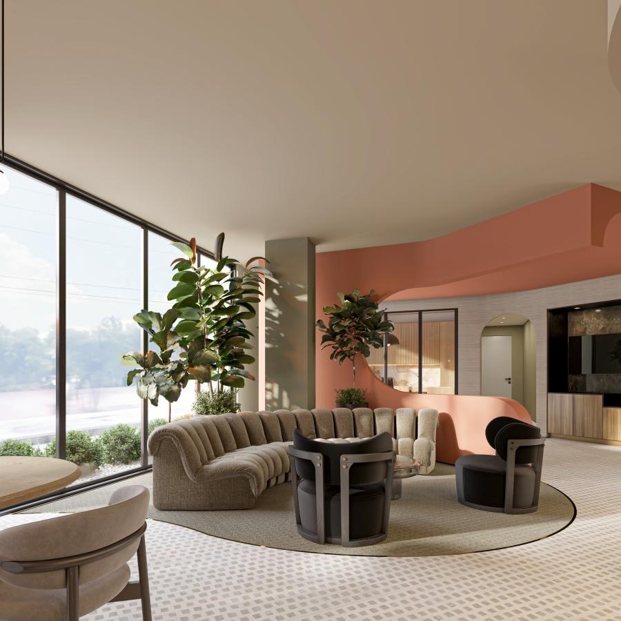 a lounge with a couch, table and chairs