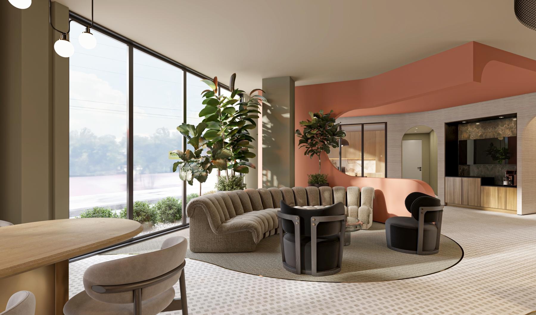 a lounge with a couch, table and chairs